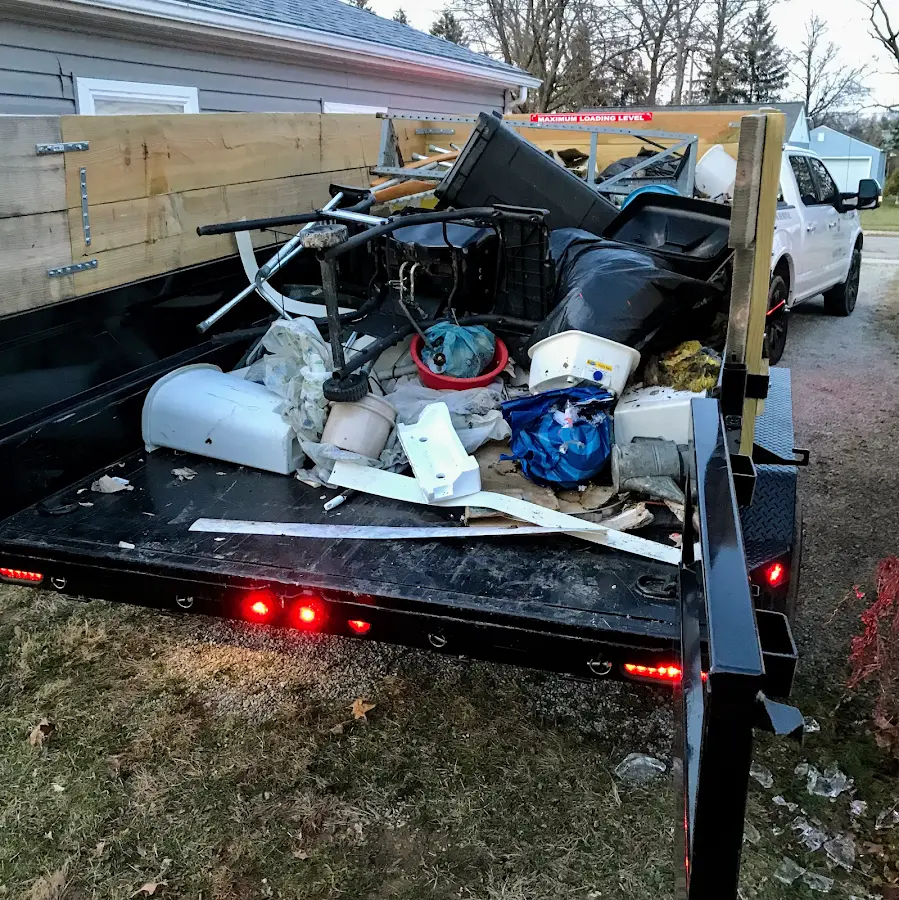 Roll-off dumpster delivered to a residential driveway in Porter