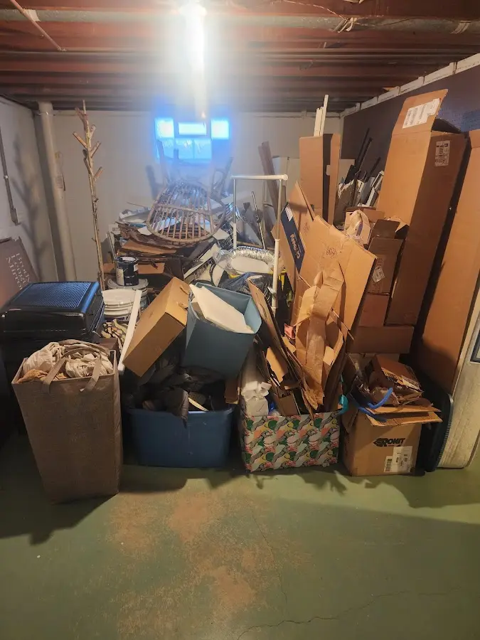 Roll-off dumpster container at job site for Construction Dumpster Rental in Porter